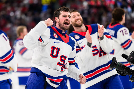 Charlie McAvoy of USA celebrates