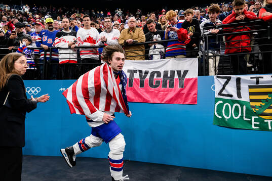 Quinn Hughes of USA celebrates