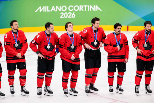 Bo Horvat, Macklin Celebrini and Thomas Harley of Canada