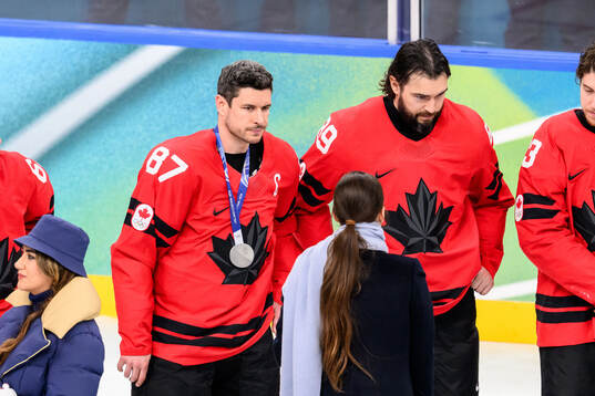 Sidney Crosby of Canada looks dejected