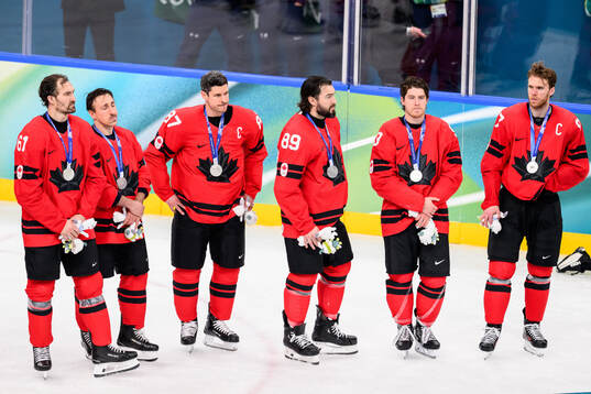Sidney Crosby, Drew Doughty of Canada looks dejected