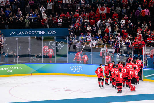 Players of Canada leave the ice