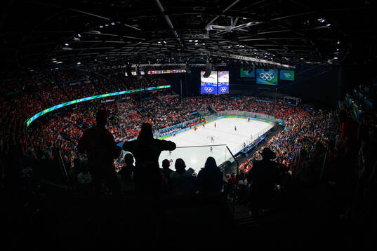 Spectators watching the men's ice hockey final between