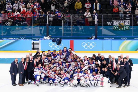 Players and staff of USA celebrate
