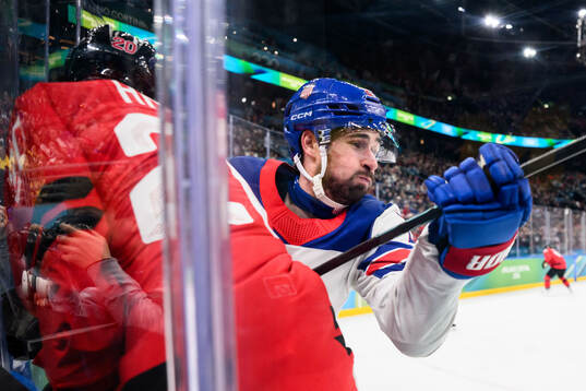 Dylan Larkin of USA and Thomas Harley of Canada in the