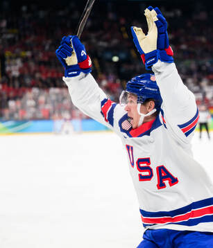 Matt Boldy of USA celebrates