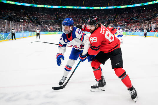 Brock Nelson of USA and Drew Doughty of Canada in the men's
