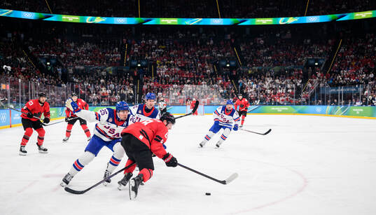 Charlie McAvoy of USA and Cale Makar of Canada in the men's