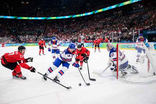 Macklin Celebrini and Sam Reinhart of Canada against Brock
