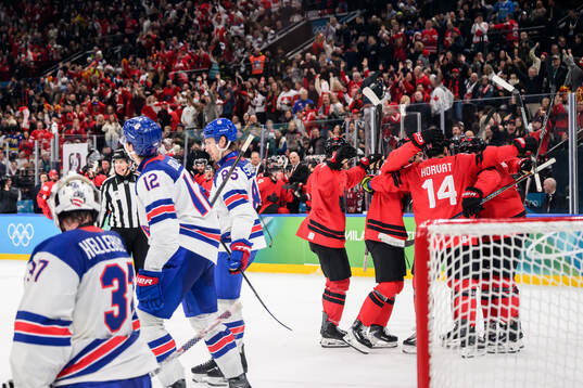 Cale Makar of Canada celebrate with teammates