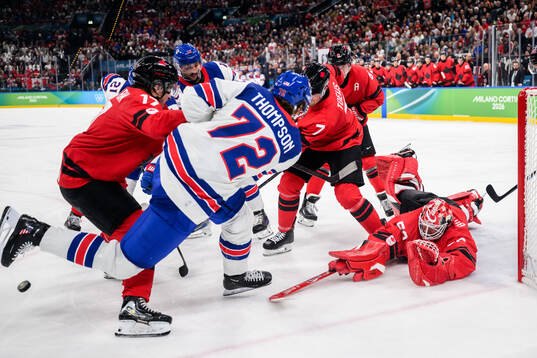 Tage Thompson of USA against Macklin Celebrini, Devon Toews