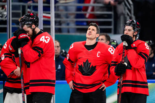 Sidney Crosby of Canada looks dejected