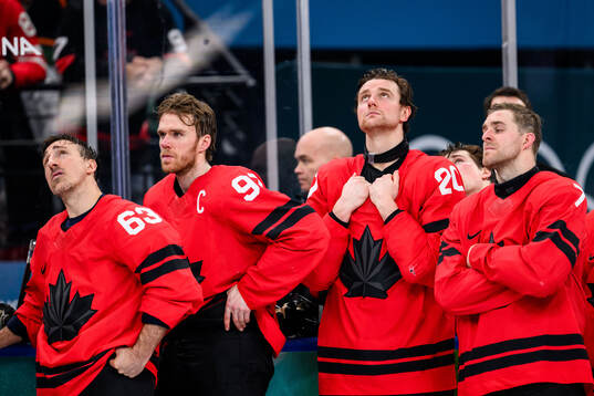 Brad Marchand, Connor McDavid, Thomas Harley and Devon