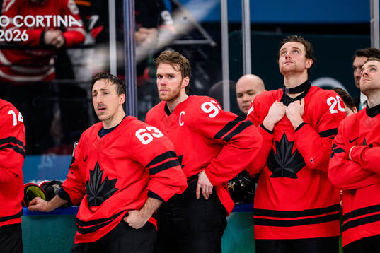 Brad Marchand, Connor McDavid and Thomas Harley of Canada