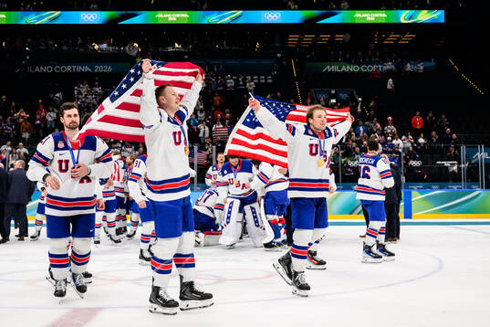 Dylan Larkin andMatthew Tkachuk of USA celebrate