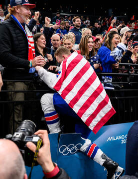Brady Tkachuk of USA celebrate