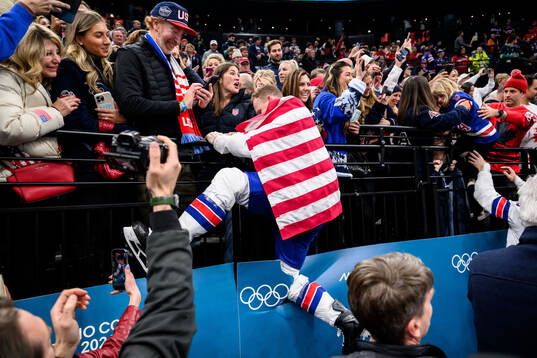Brady Tkachuk of USA celebrate