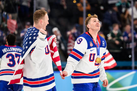 Brady Tkachuk and Matthew Tkachuk of USA celebrate
