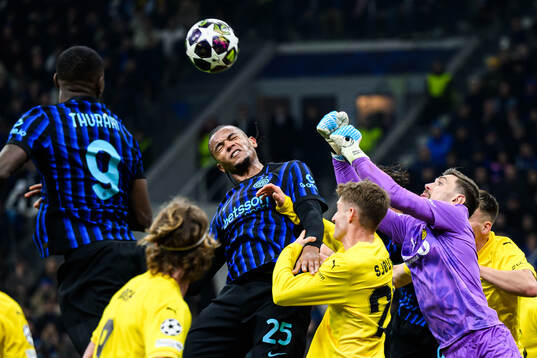 Manuel Akanji of Inter and goalkeeper Nikita Haikin of