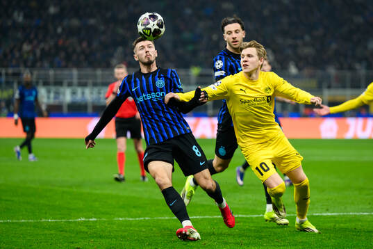 Petar Sučić of Inter and Jens Petter Hauge of Bodø/Glimt