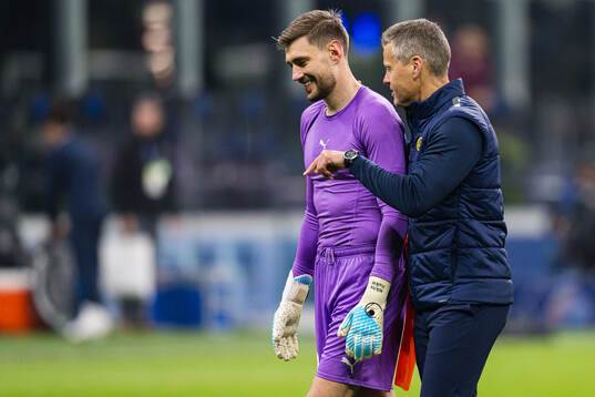 Goalkeeper Nikita Haikin and head coach Kjetil Knutsen of