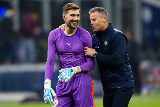 Goalkeeper Nikita Haikin and head coach Kjetil Knutsen of