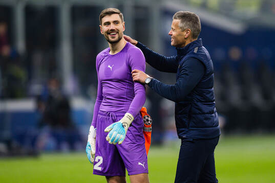Goalkeeper Nikita Haikin and head coach Kjetil Knutsen of
