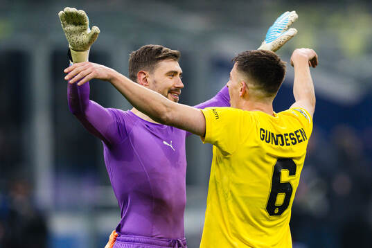 Goalkeeper Nikita Haikin and Jostein Gundersen of