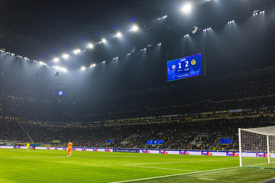 Spectators in the stands at San Siro