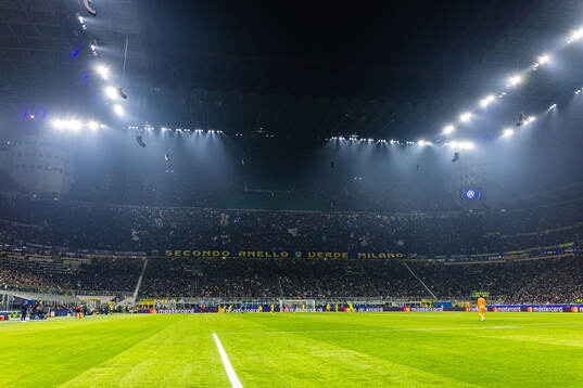 Spectators in the stands at San Siro