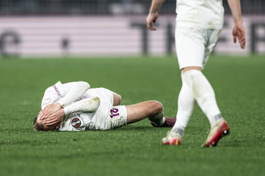 Jón Dagur Thorsteinsson of Brann in pain