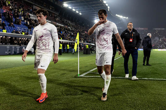 Denzel De Roeve and Thore Pedersen of Brann looks dejected