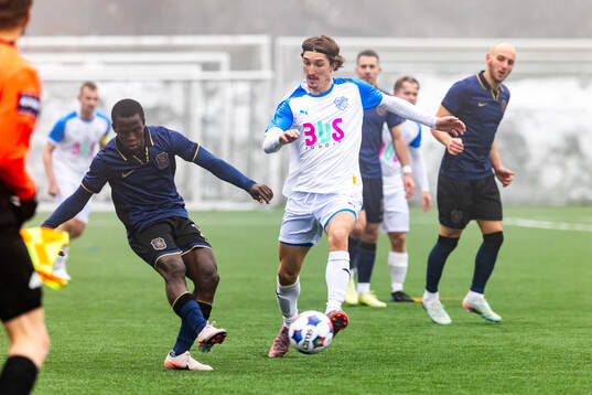 AIKs Stanley Wilson Omondi och Oddevolds Hugo Engström