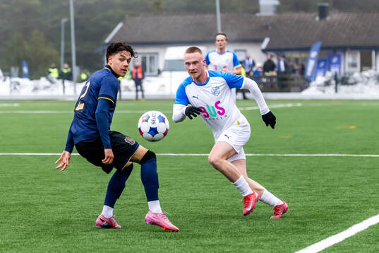 AIKs Charlie Pavey och Oddevolds Adam Engelbrektsson