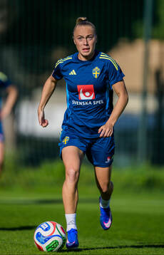 At a training session with the women's national football