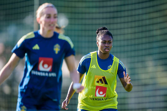 Kosovare Asllani and Monica Jusu Bah at a training session