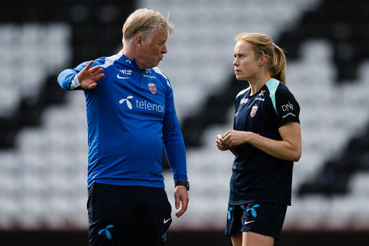 Assistant coach Kjetil Lone and Julie Blakstad of the