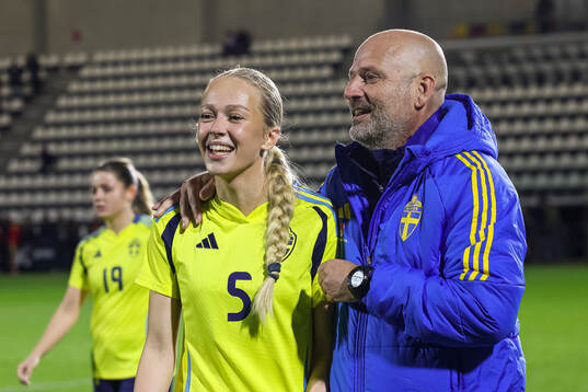 Lisa Löwing and coach Magnus Wikman of Sweden