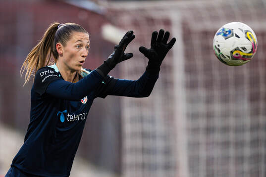 Goalkeeper Cecilie Hauståker Fiskerstrand of Norway warms