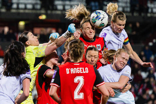 Goalkeeper Mariella El Sherif of Austria and Ada Hegerberg