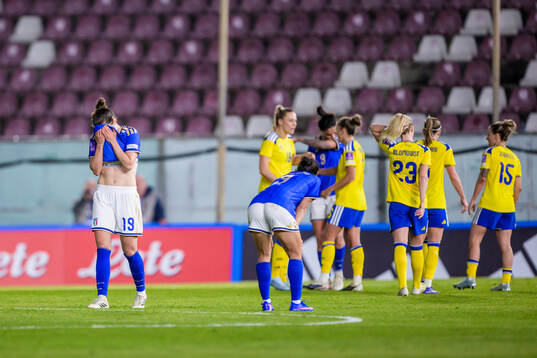 Martina Lenzini of Italy looks dejected