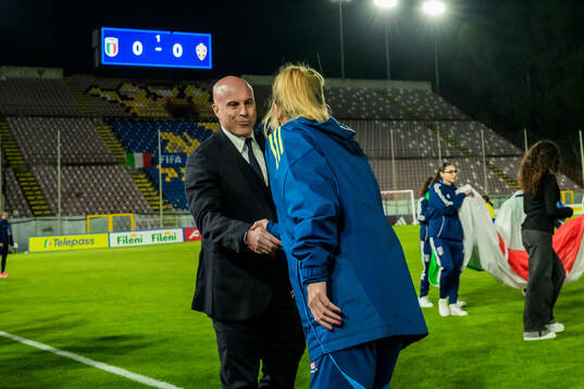 Head coach Andrea Soncin of Italy shakes hands with