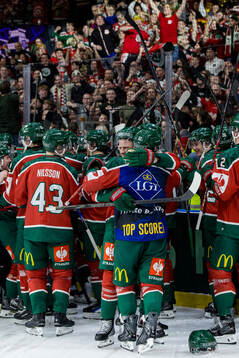Nicklas Lasu of Frölunda celebrates with teammates