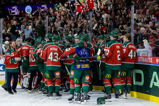 Nicklas Lasu of Frölunda celebrates with teammates