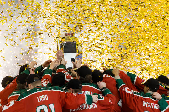 Players of Frölunda celebrate with the trophy