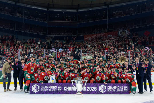 Players of Frölunda celebrate with the trophy