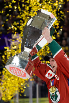 Max Friberg of Frölunda celebrates with the trophy