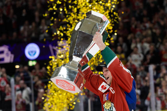 Max Friberg of Frölunda celebrates with the trophy