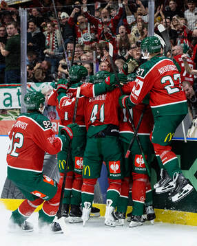 Players of Frölunda celebrate