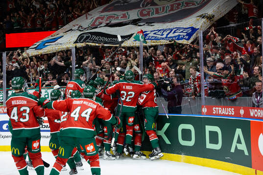 Players of Frölunda celebrate
